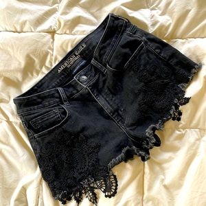 AE black jean shorts with lace detail
